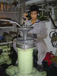 Engine valve grinding